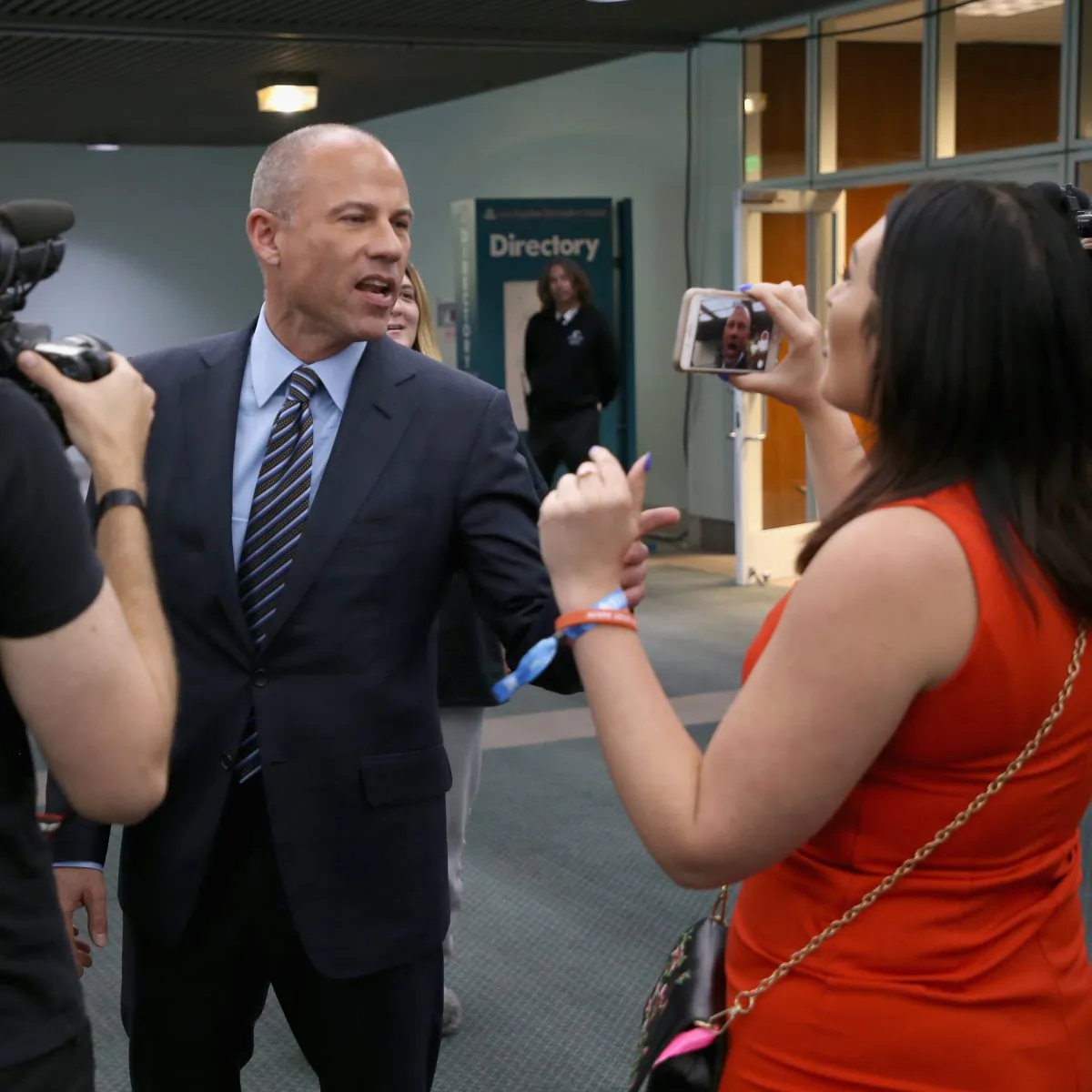 Michael Avenatti (L) and Laura Loomer attend Politicon 2018 at Los Angeles Convention Center in Los Angeles, California, on Oct. 20, 2018. (Phillip Faraone/Getty Images for Politicon)