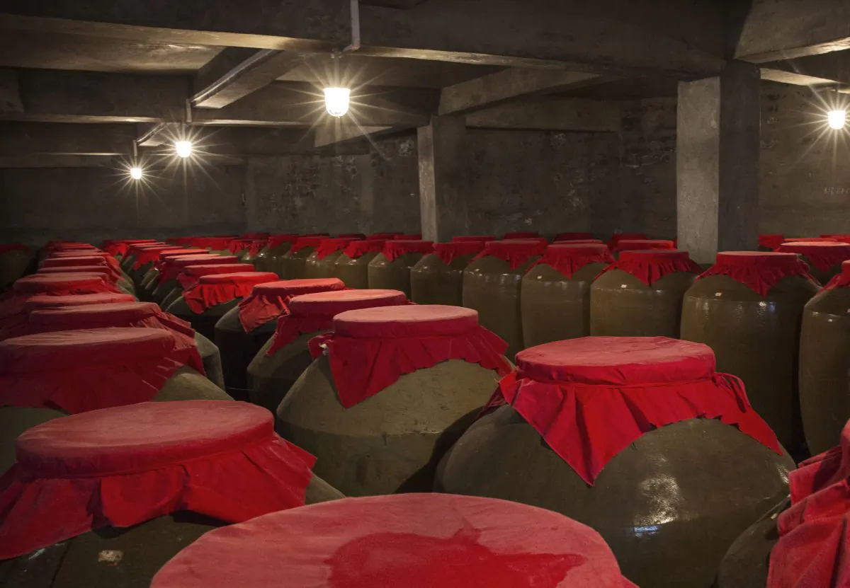Vats of locally made wine called baijiu in a distillery on the Chishui RIver, on September 23, 2016 in Maotai,Guizhou province, China. (Kevin Frayer/Getty Images)