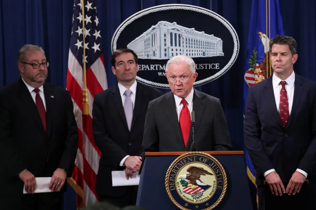 U.S. Attorney General Jeff Sessions announces a criminal law enforcement action involving China; and a new Department of Justice initiative focusing on "China’s continued economic criminal activity" during a news conference at the Justice Department in Washington, D.C. on Nov. 1, 2018. (Jonathan Ernst/Reuters)