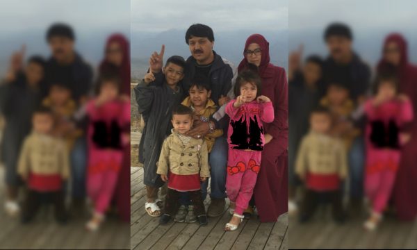 Abdukadir with his wife and four children