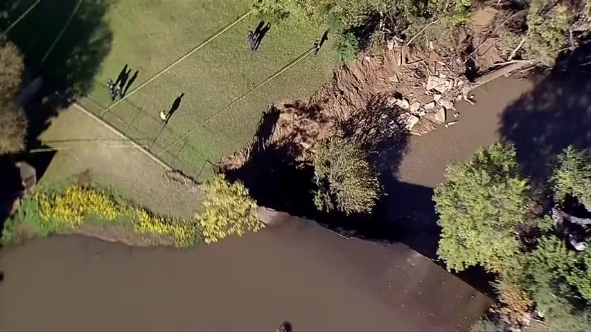 dam collapse due to flooding in texas