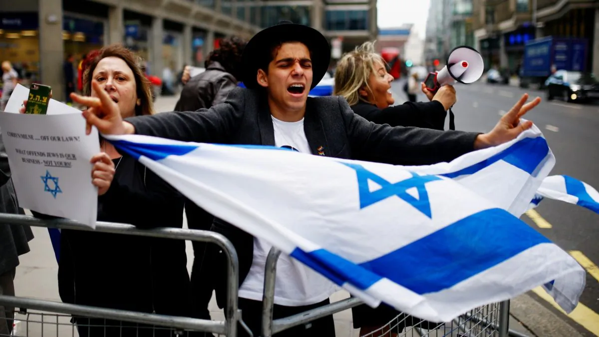 Demonstrators take part in protests outside a meeting of the National Executive of Britain's Labour Party, discussing the party's definition of anti-Semitism, in London, on Sept. 4, 2018. (Henry Nicholls/Reuters)