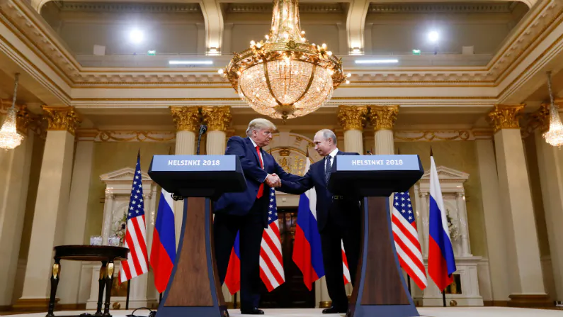 President Donald Trump and Russia's President Vladimir Putin shake hands during a joint news conference after their meeting in Helsinki, Finland, on July 16, 2018. (Kevin Lamarque/File Photo/Reuters)