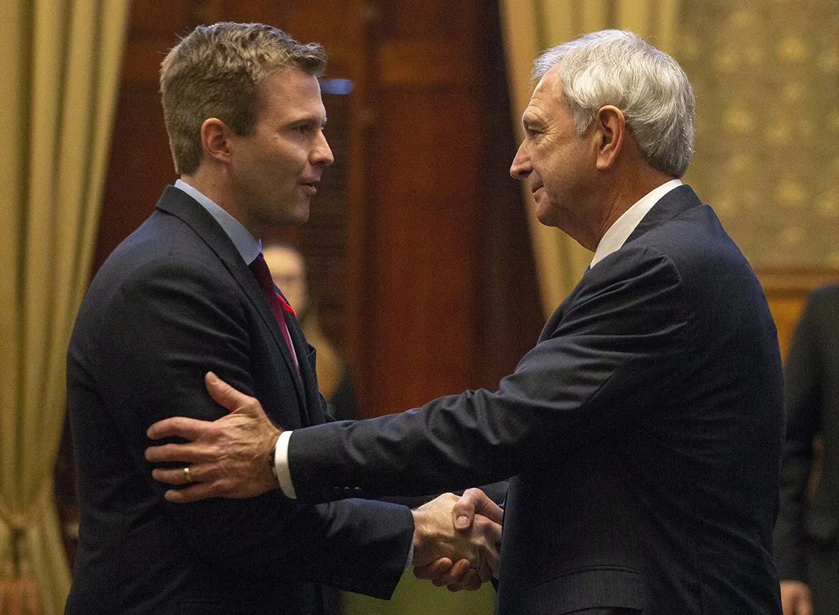 New Brunswick Progressive Conservative leader and premier-designate Blaine Higgs (R) and New Brunswick Liberal leader Brian Gallant at the New Brunswick Legislature in Fredericton on Nov. 2, 2018. (James West/The Canadian Press)