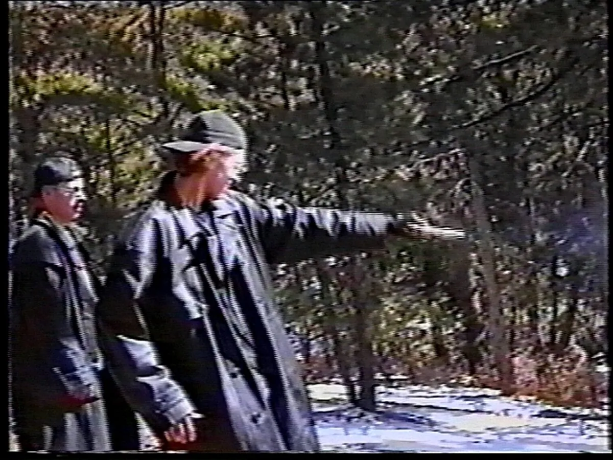 Eric Harris (L) watches as Dylan Klebold practices shooting a gun at a makeshift shooting range in Douglas County, Colo. on March 6, 1999. (Jefferson County Sheriff's Department via Getty Images)