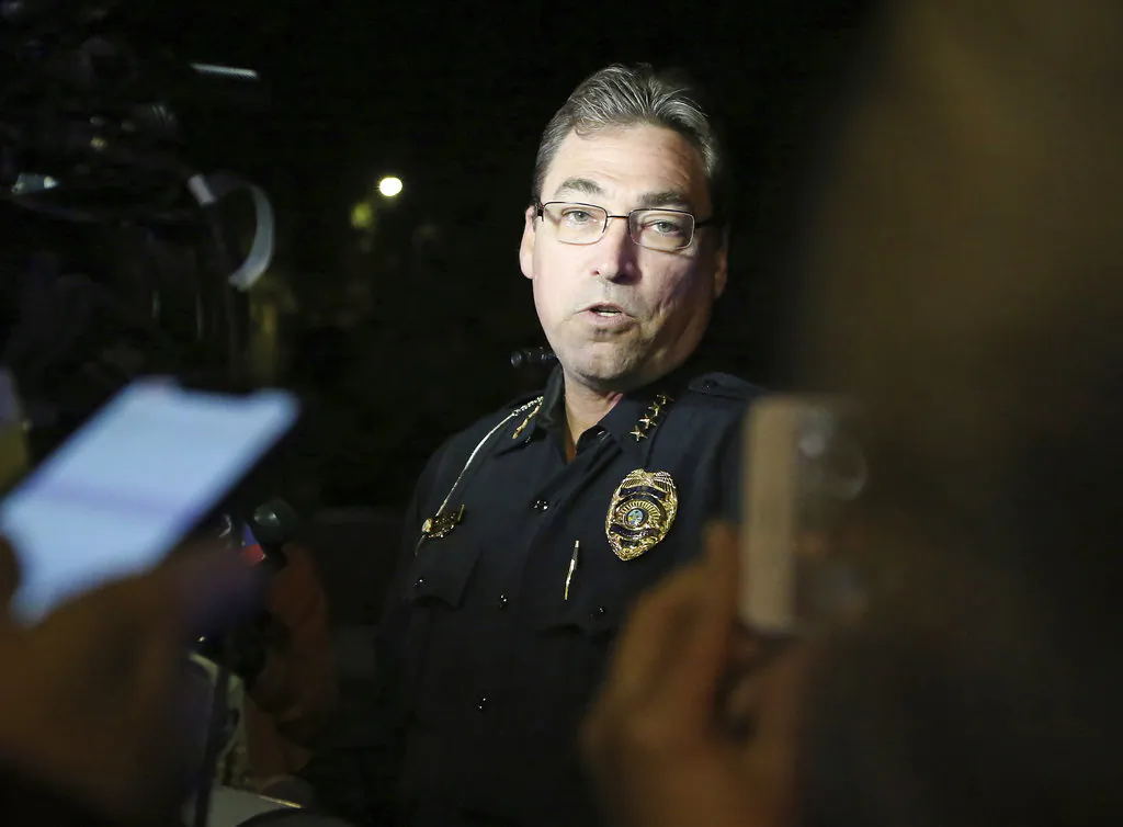 Tallahassee police chief Michael DeLeo speaks to the press at the scene of a shooting in Tallahassee, Fla., Nov. 2, 2018, (AP Photo/Steve Cannon)