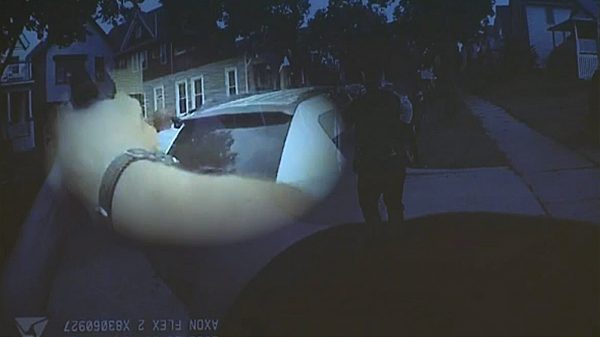 Mario Hobson holds a gun to his head