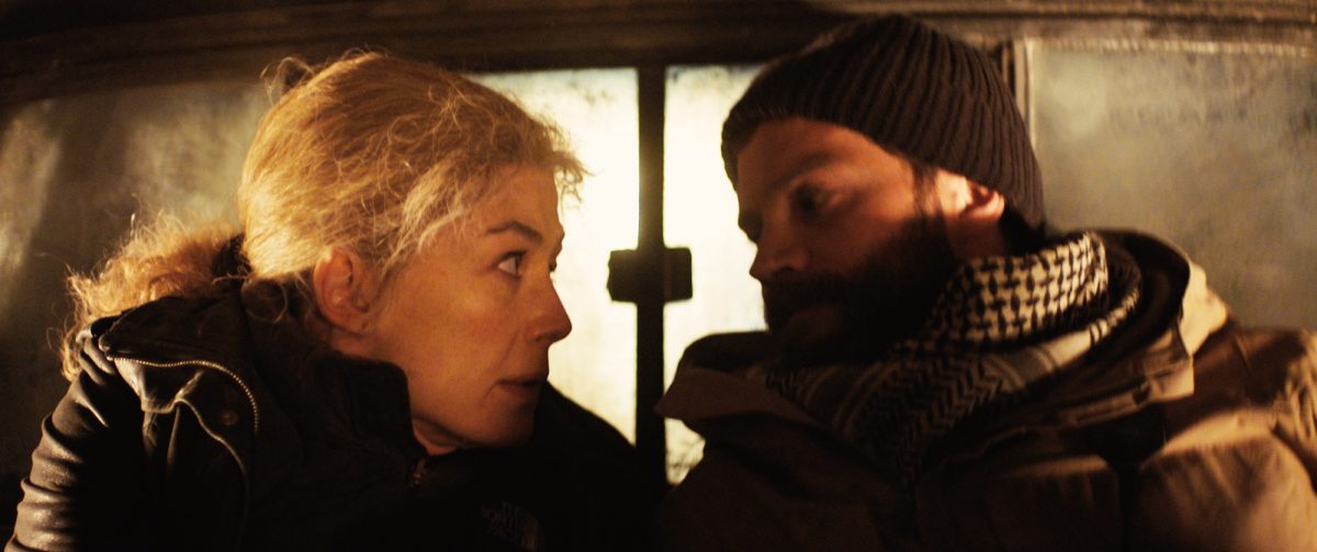 Rosamund Pike Jamie Dornan in a car