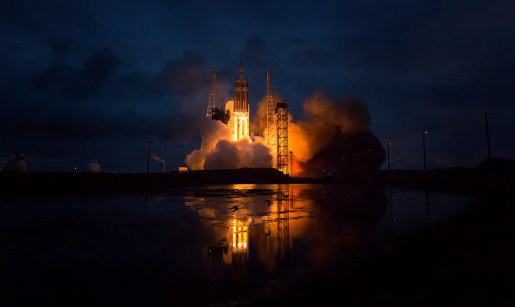 In this handout provided by NASA,The United Launch Alliance Delta IV Heavy rocket with NASA's Orion spacecraft mounted atop, lifts off from Cape Canaveral Air Force Station's Space Launch Complex 37 at 7:05 a.m. EST in Cape Canaveral, Fla. on Dec. 5, 2014. (Bill Ingalls/NASA via Getty Images)