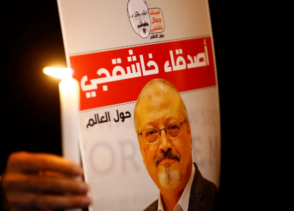 A demonstrator holds a poster with a picture of Saudi journalist Jamal Khashoggi outside the Saudi Arabia consulate in Istanbul, Turkey on Oct. 25, 2018. (Osman Orsal/Reuters)