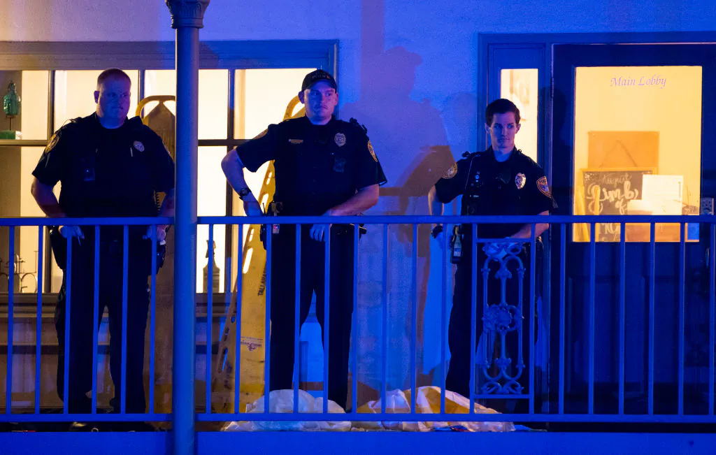 Tallahassee Police officers are stationed outside the HotYoga Studio after a gunman killed one person and injured several others inside in Tallahassee, Fla on Nov. 2, 2018. (Mark Wallheiser/Getty Images)
