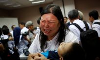 Tearful Relatives of Indonesia Jet Crash Victims Demand Answers