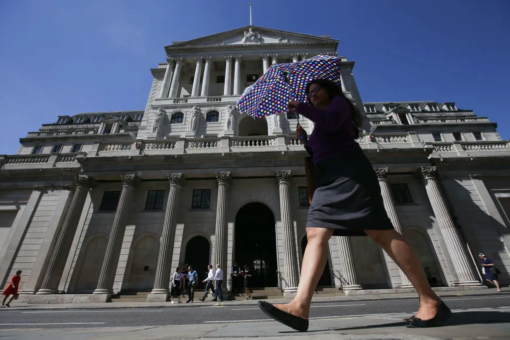 Pedestrians walk past the Bank of England in the City of London on Aug. 2, 2018. (Daniel Leal-Olivas/AFP/Getty Images)