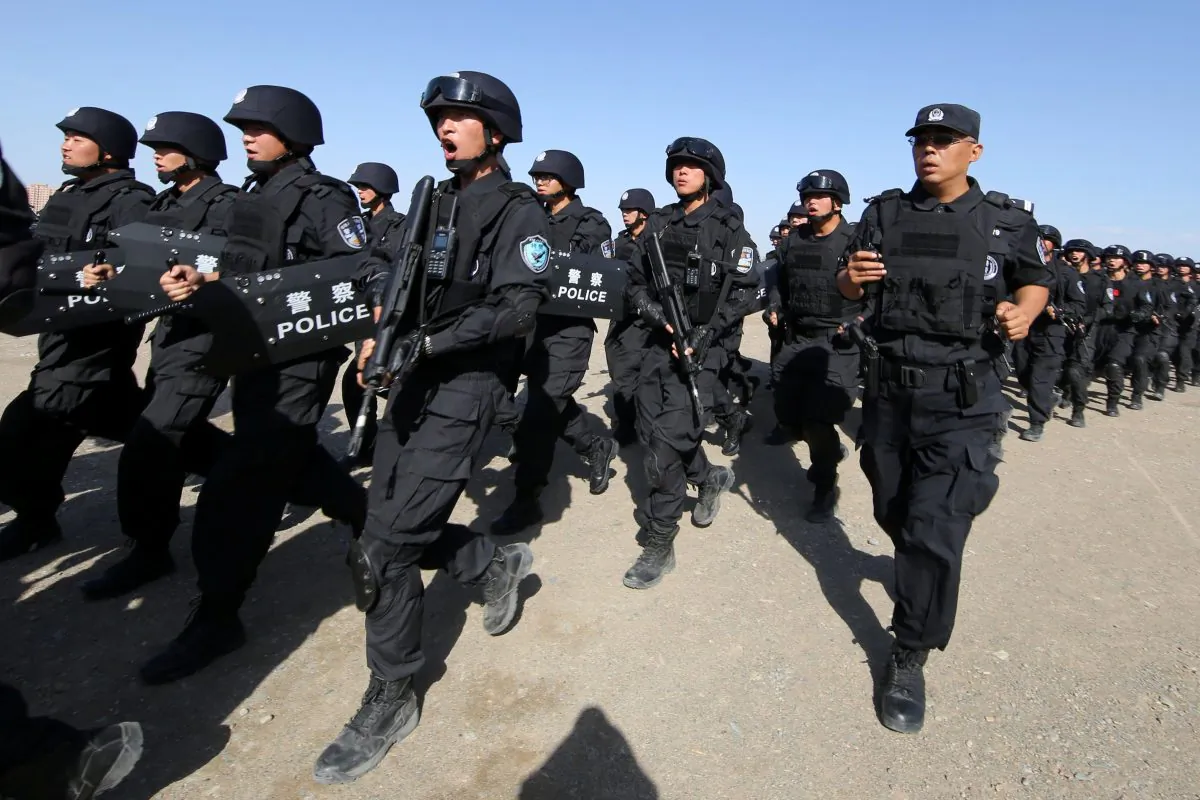 Chinese soldiers participate in an anti-terror drill in Hami, Xinjiang region, China on July 8, 2017. (Reuters)