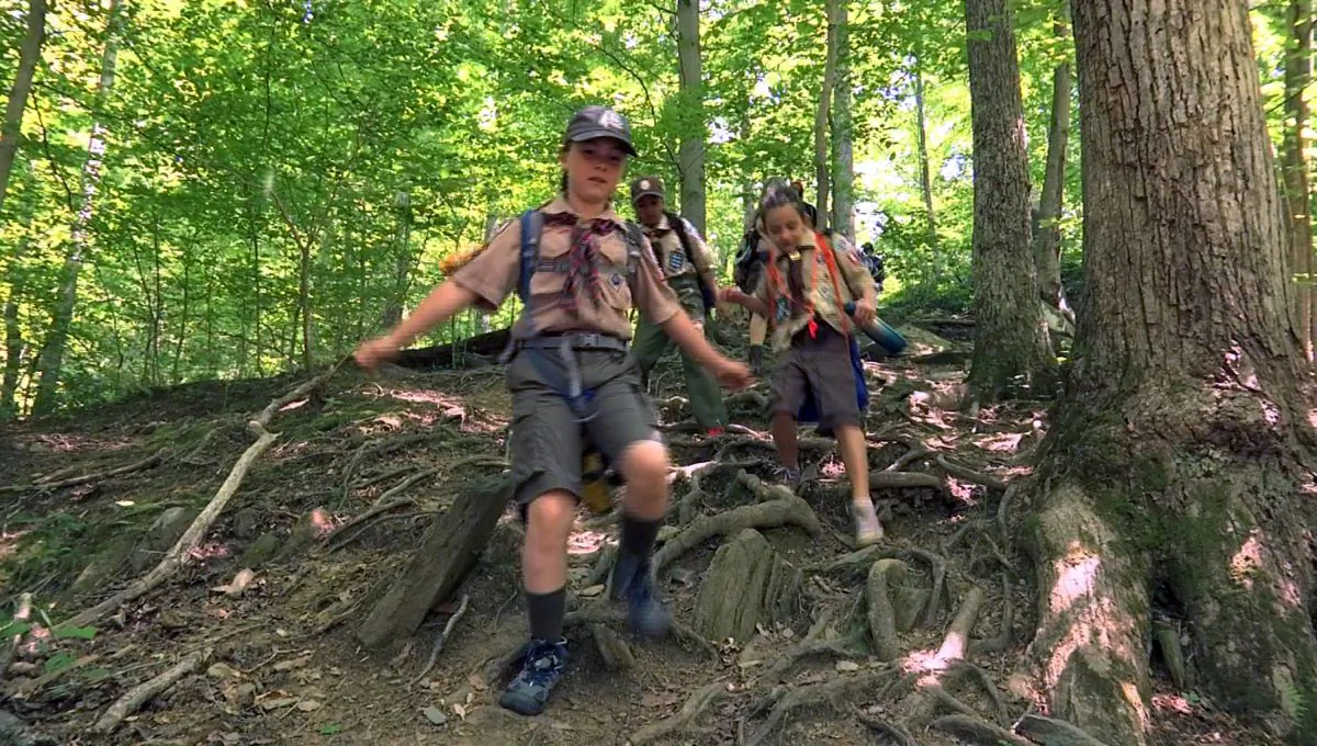 Girls from Cub Scout Den 13, a suburban Virginia Cub Scout unit made up of girls who are on their way to next year becoming the first female Scouts in the Boy Scouts of America as part of the the newly named "Scouts BSA" program, participate in a hike in this still image from video shot in McLean, Virginia, on May 20, 2018. (Greg Savoy/File Photo/Reuters)