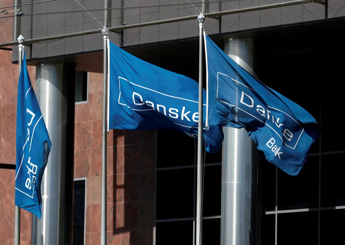 Danske Bank flags flutter at the bank's Estonian branch in Tallinn, Estonia, on Aug. 3, 2018. (Ints Kalnins/Reuters)