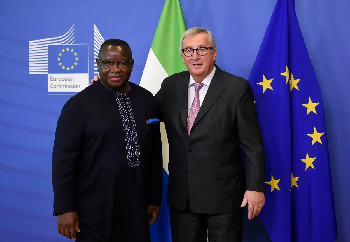 EU Commission President Jean Claude Juncker (R) welcomes President of Sierra Leone Julius Maada Bio before to their meeting at the EU headquarters in Brussels on Nov. 6, 2018. (John Thys/AFP/Getty Images)
