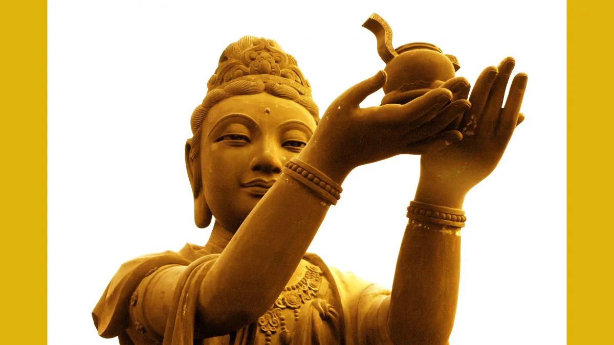 One of the statues of a bodhisattva giving offerings to the Tian Tan Big Buddha  located at Ngong Ping, Lantau Island, in Hong Kong. (Sun Mingguo/The Epoch Times)