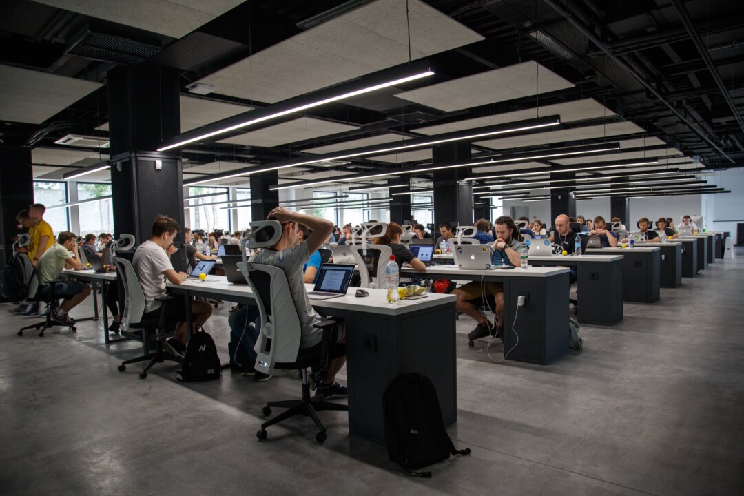 Sitting all day can be very unhealthy, but sit-stand desks offer an alternative that researchers have found can work. (Alex Kotliarskyi/Unsplash)