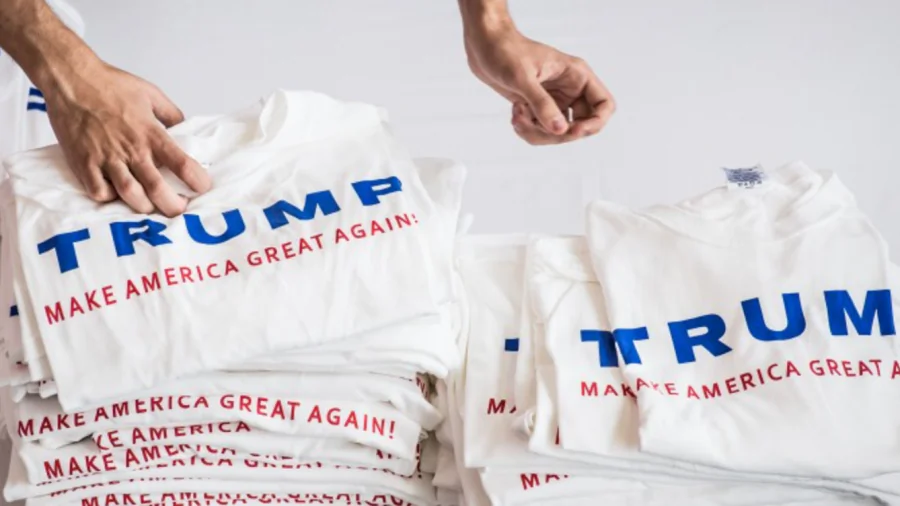 Volunteers pass out Donald Trump T-shirts at a campaign event in Columbia, S.C., on Sept. 23, 2015. (Sean Rayford/Getty Images)