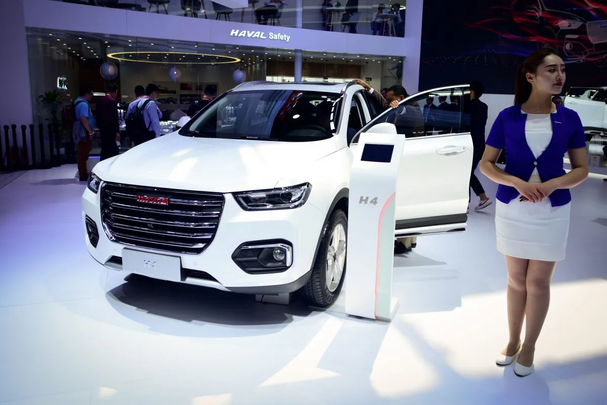A Haval H4 car is displayed at the Beijing auto show on April 25, 2018. - Global carmakers touted their latest electric and SUV models in Beijing as they warily welcomed China's promise of better foreign access to the world's largest auto market, where domestic vehicles are making major inroads. Industry behemoths like Volkswagen, Daimler, Toyota, Nissan, Ford and others are displaying more than 1,000 models and dozens of concept cars at the Beijing auto show. (Photo by WANG ZHAO / AFP)        (Photo credit should read WANG ZHAO/AFP/Getty Images)