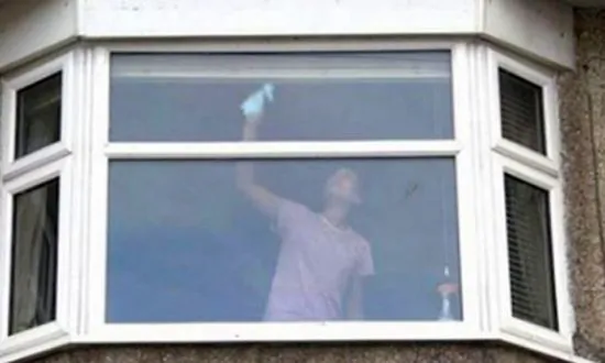 UK Police Posts Photo of Woman Cleaning Windows as a Warning