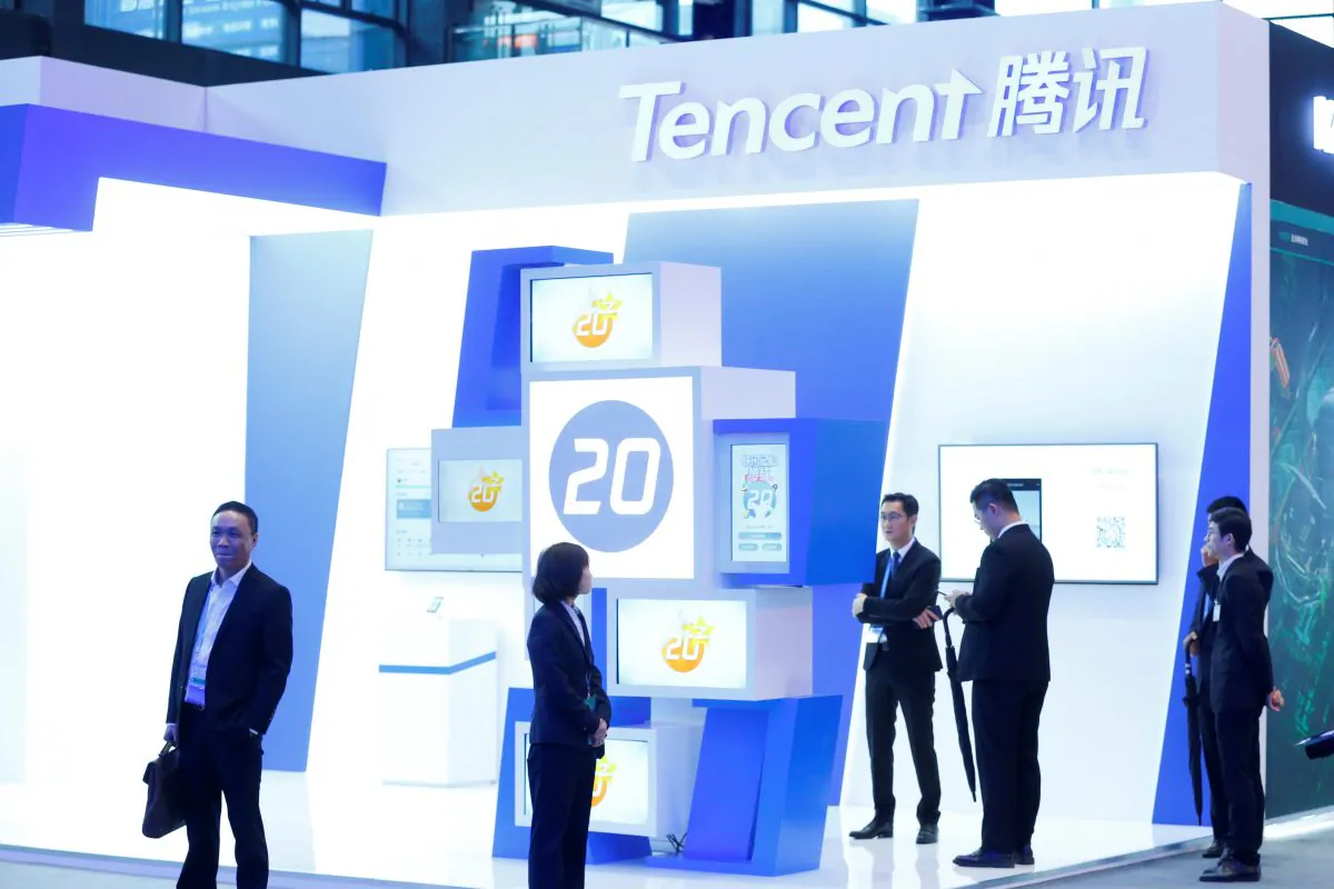Tencent Holdings Chairman and CEO Pony Ma (C) visits the Tencent booth following the opening ceremony of the fifth World Internet Conference (WIC) in Wuzhen, Zhejiang Province, China on Nov. 7, 2018. (Reuters) 
