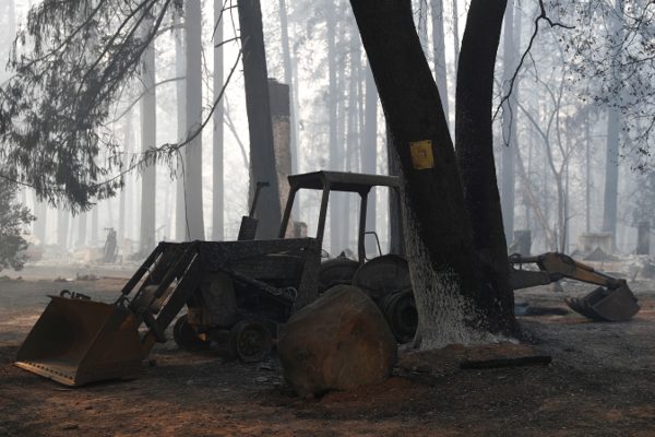 A burned out bulldozer destroyed by the Camp Fire is seen in Paradise