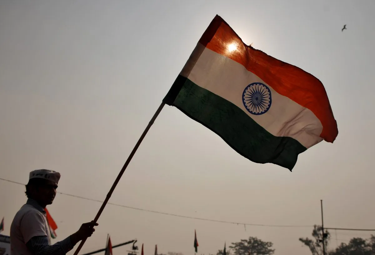 India's national flag held during a rally in Ram Lila Ground in New Delhi on Dec. 27, 2011. (Sajjad Hussain/AFP/Getty Images)