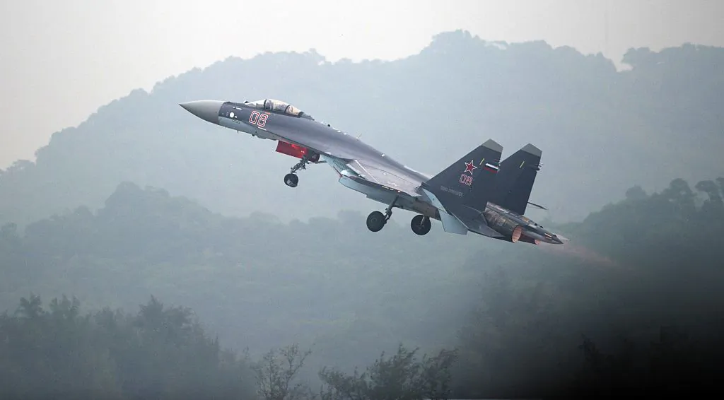 A Sukhoi SU-35 fighter jet takes off during a test flight ahead of the Airshow China 2014 in Zhuhai, a city in southern China's Guangdong Province, on Nov. 10, 2014. (Johannes Eisele/AFP/Getty Images)