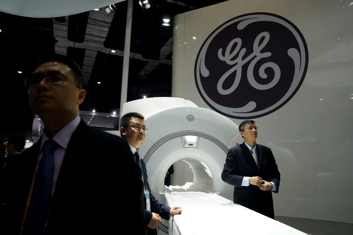A General Electric sign during the China International Import Expo in Shanghai on Nov. 6, 2018. Federal prosecutors charged two Chinese men with stealing information related to GE’s turbine technology for the benefit of the Chinese regime. (Aly Song/Reuters)