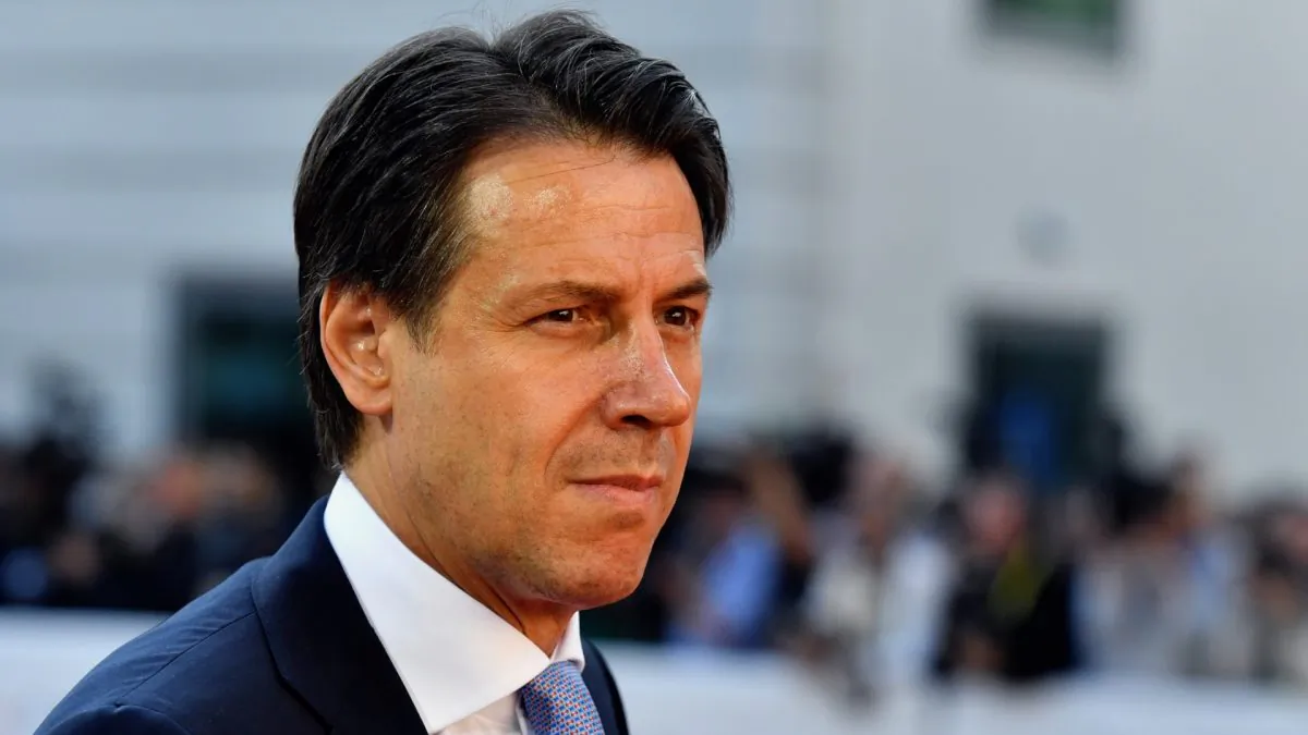 Italian Prime Minister Giuseppe Conte arrives at the informal EU summit, a gathering of leaders of Libya’s quarrelling factions and of countries keen on stabilizing the North African nation opens in Salzburg, Austria, on Nov. 12, 2018. (Kerstin Joensson/AP)