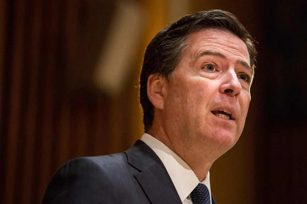 Then-FBI Director James Comey answers questions at a press conference in New York City on Dec. 16, 2015. (Andrew Burton/Getty Images)