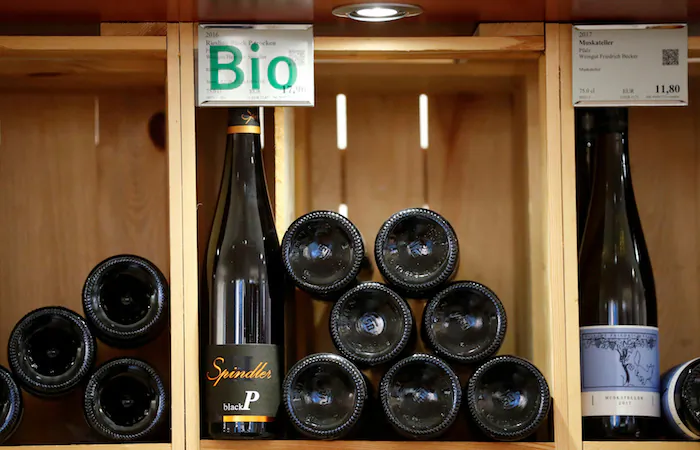 Organic wines for sales are seen in a wine rack at Moevenpick Weinkeller wine shop in Berlin, Germany, Oct. 15, 2018. (Reuters/Fabrizio Bensch)