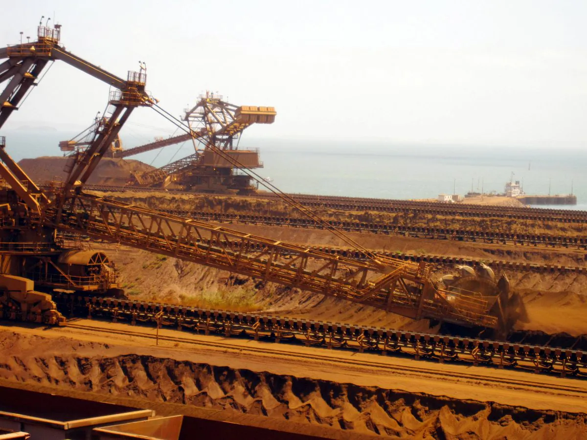 Remote-controlled stackers and reclaimers moving iron ore at Rio Tinto's Port Dampier operations in Western Australia's Pilbara region. (Amy Coopes/AFP/Getty Images)