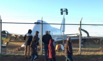 Crowd Watches as Backhoe Rips Into Mangled Plane After Halifax Runway Overrun