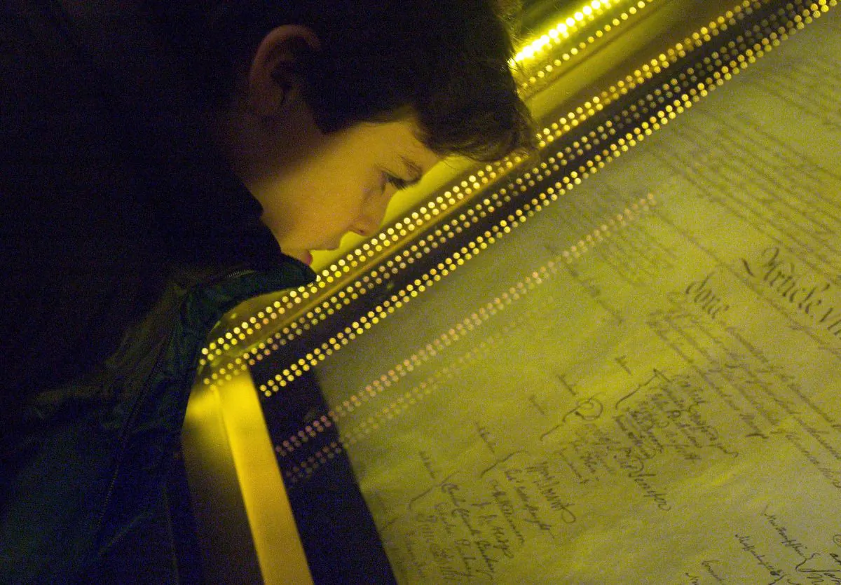 In this file photo, a school student views the original Constitution in Washington, DC. Opponents of the Electoral College have claimed that it was established to protect slavery. (Brendan Smialowski/Getty Images)