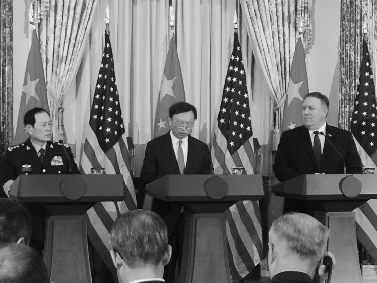 Director of the Office of Foreign Affairs Yang Jiechi (C) reads from a script in answer to a question at the U.S.-China Diplomatic Security Dialogue in Washington on Nov. 9, 2018. (Jennifer Zeng/The Epoch Times)