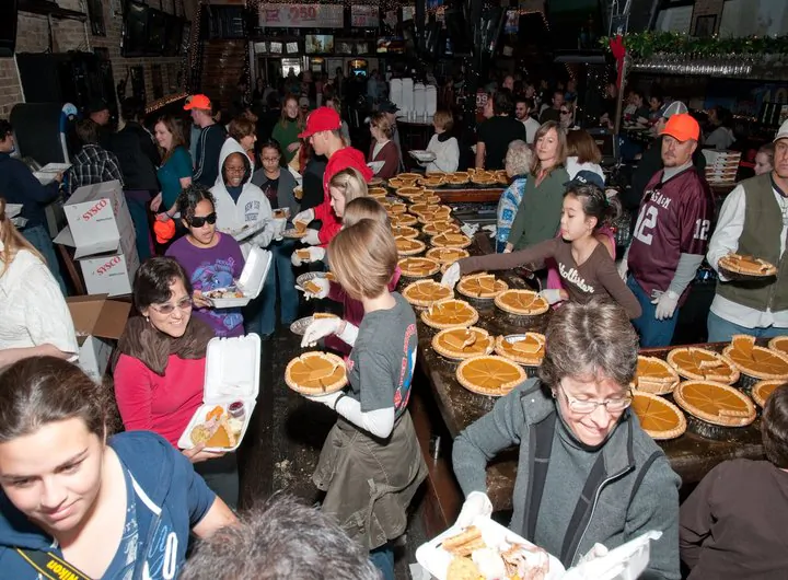 Helpers assemble Thanksgiving meals to distribute in Texas in 2013. (Courtesy of Operation Turkey)
