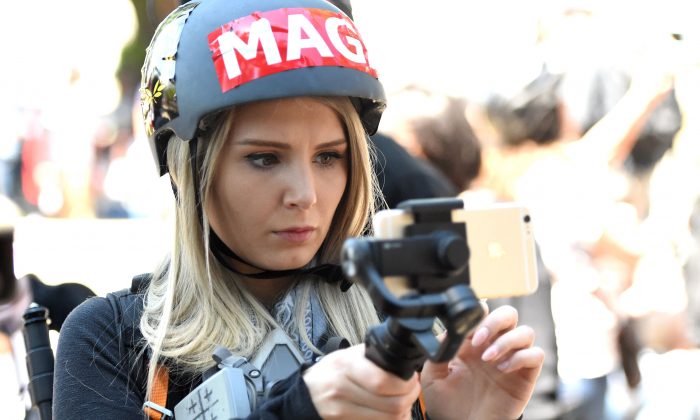 Canadian conservative and libertarian activist Lauren Southern livestreams a video during a rally in Berkeley, Calif., on April 27, 2017. (Josh Edelson/AFP/Getty Images)