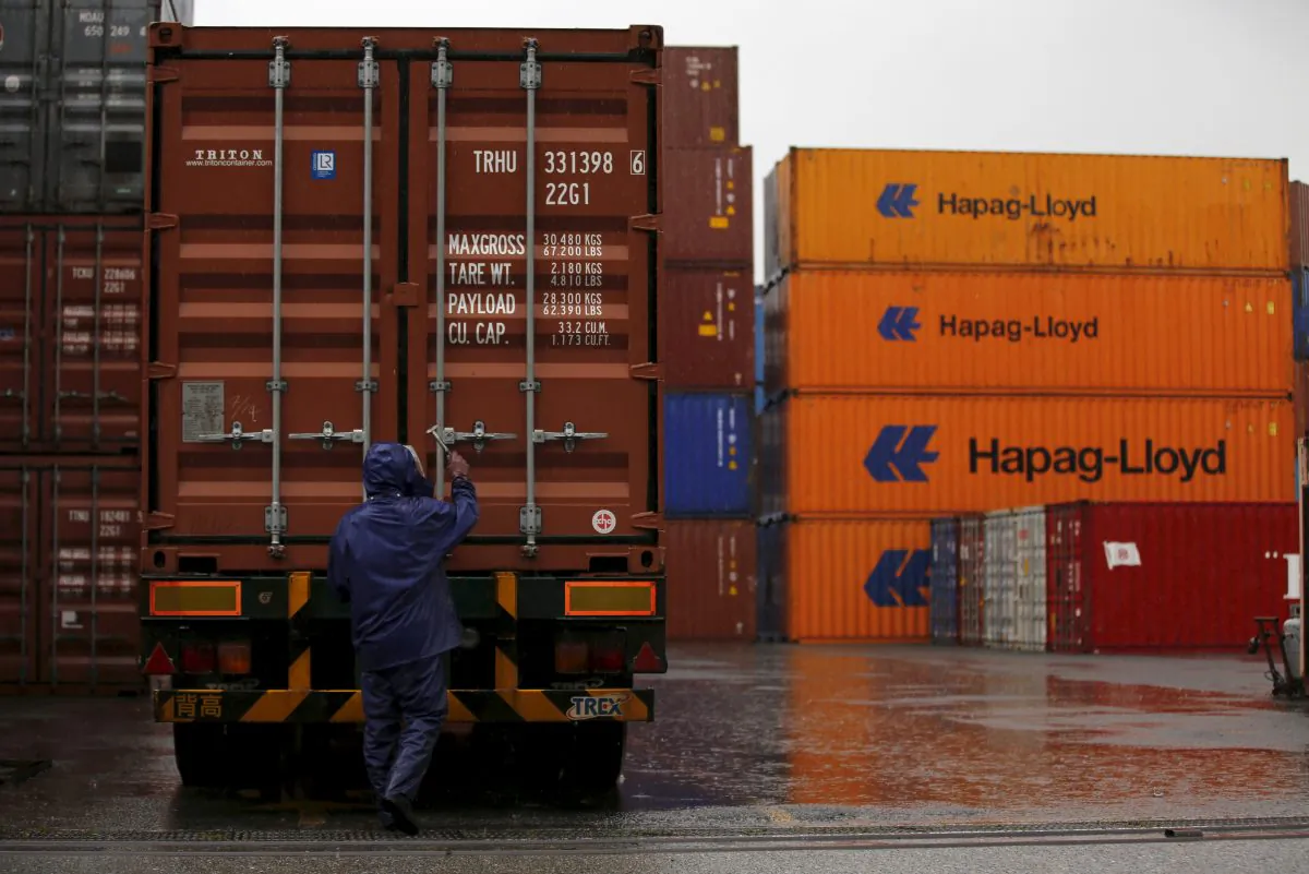 A man works at a container area at a port in Tokyo, Japan on Sept. 8, 2015. (Toru Hanai/File Photo/Reuters)