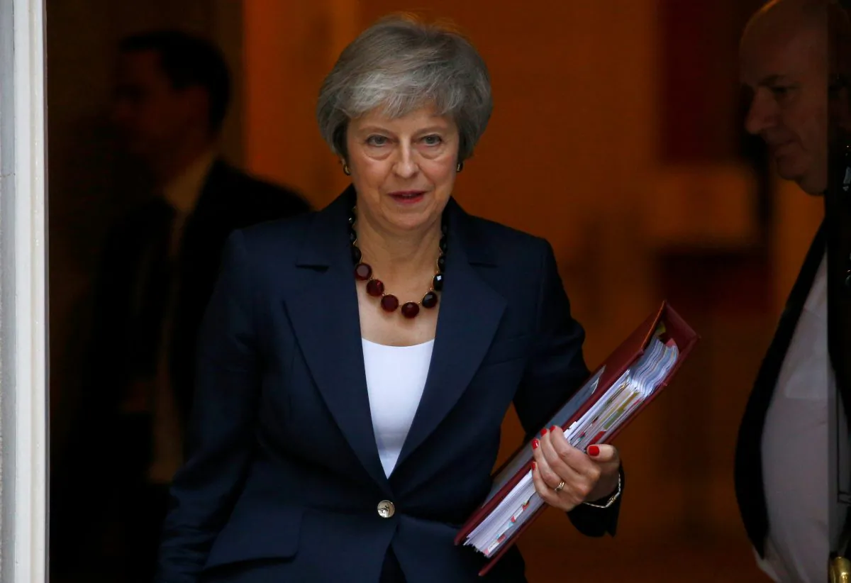 Britain's Prime Minister, Theresa May, leaves 10 Downing Street in London, on Nov. 14, 2018. (Reuters/Henry Nicholls)