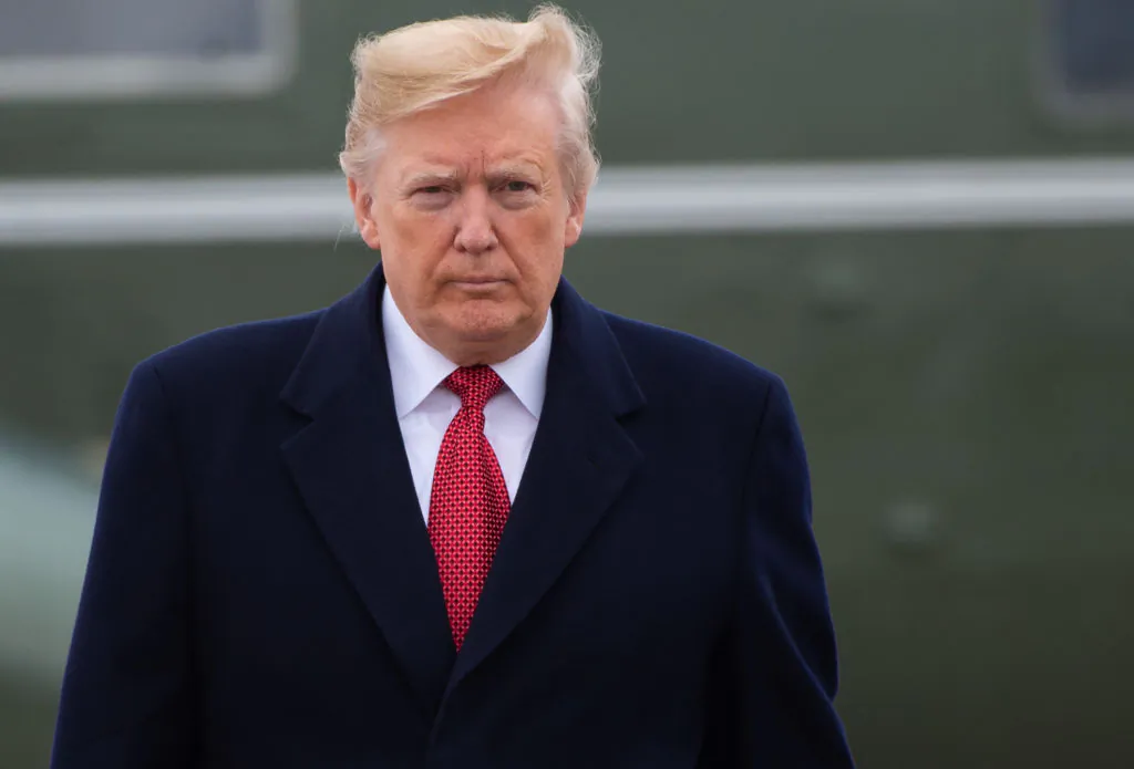 TOPSHOT - US President Donald Trump arrives to board Air Force One at Joint Base Andrews in Maryland, November 9, 2018, as they travel to Paris. (Photo by SAUL LOEB / AFP)        (Photo credit should read SAUL LOEB/AFP/Getty Images)