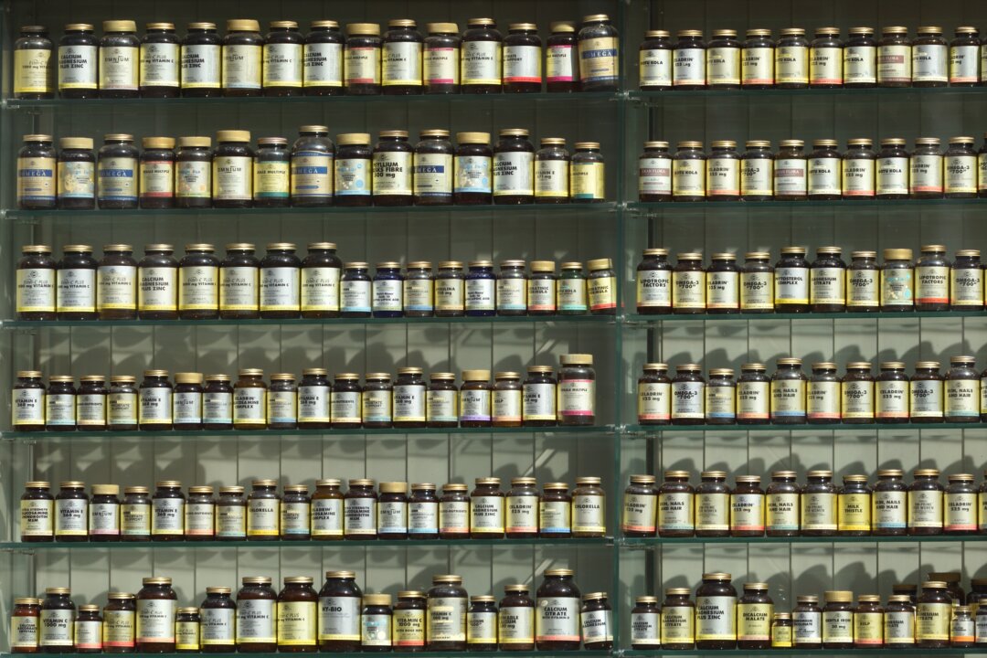 A pharmacy wall full of supplements. (Angel Sinigersky/Unsplash)