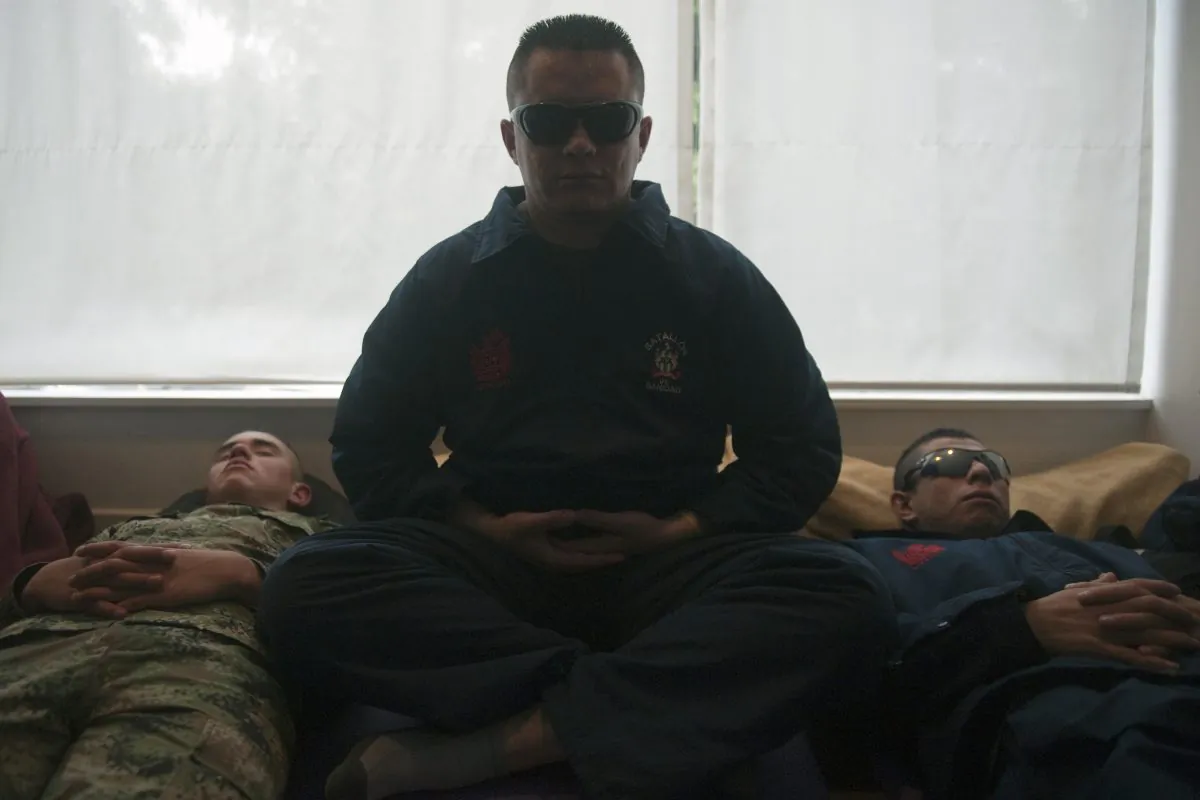 Colombian soldiers meditate during a yoga session in Bogota. (Eitan Abramovich/AFP/Getty Images)