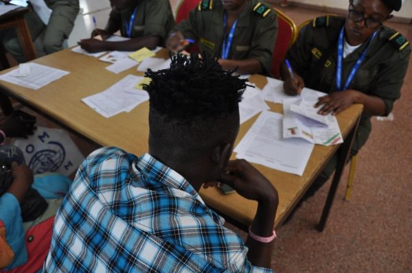 Returnees from Niger undergo border controls at the Yaounde Nsimalen International Airport in Cameroon.
