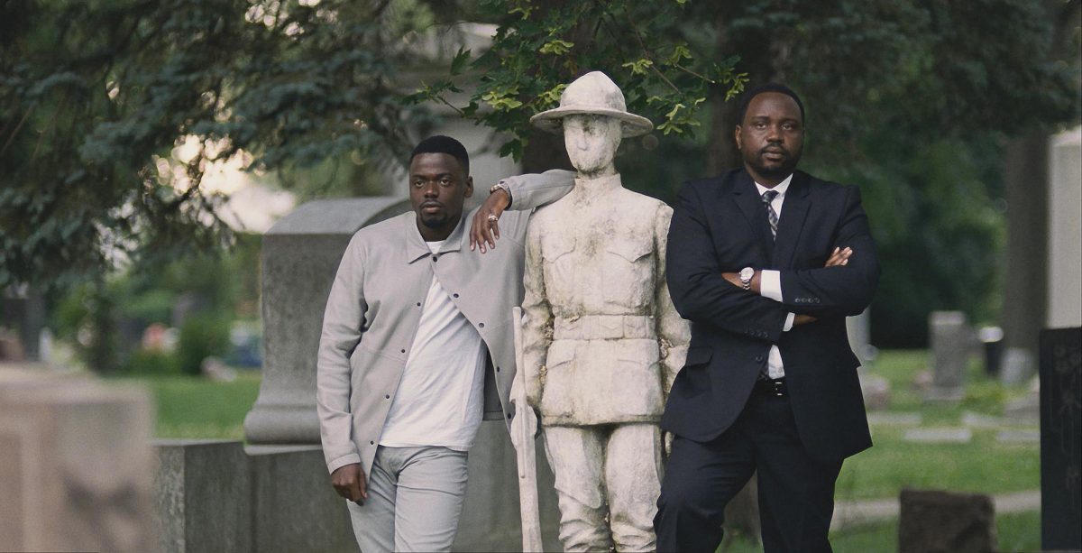 Daniel Kaluuya and Brian Tyree Henry in a graveyard