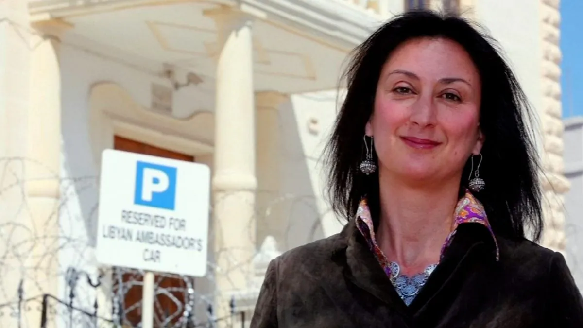 Maltese investigative journalist Daphne Caruana Galizia poses outside the Libyan Embassy in Balzan, Malta, on April 6, 2011. (Darrin Zammit Lupi/Reuters)
