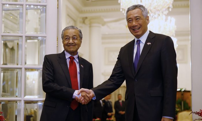 Malaysia and Singapore Vow to Strengthen Ties Amid Water Agreement ...