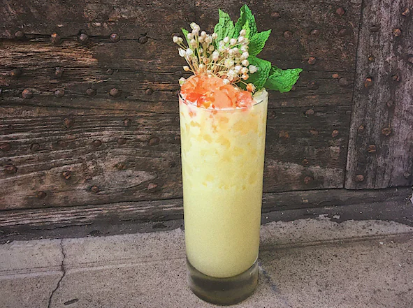 James Bolt, owner of The Gin Joint in Charleston, S.C., based the King Coco cocktail on a dish he’d tried of curry-dusted, charred okra with a yogurt dipping sauce. (Courtesy of The Gin Joint)